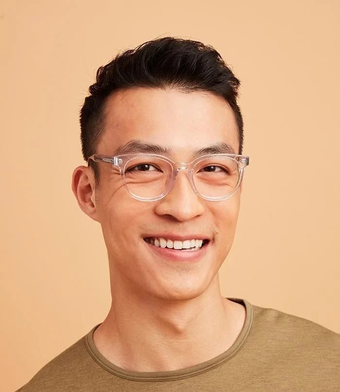Portrait of an attendee wearing glasses in a matched group